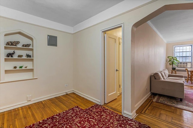 interior space with built in features and light hardwood / wood-style flooring