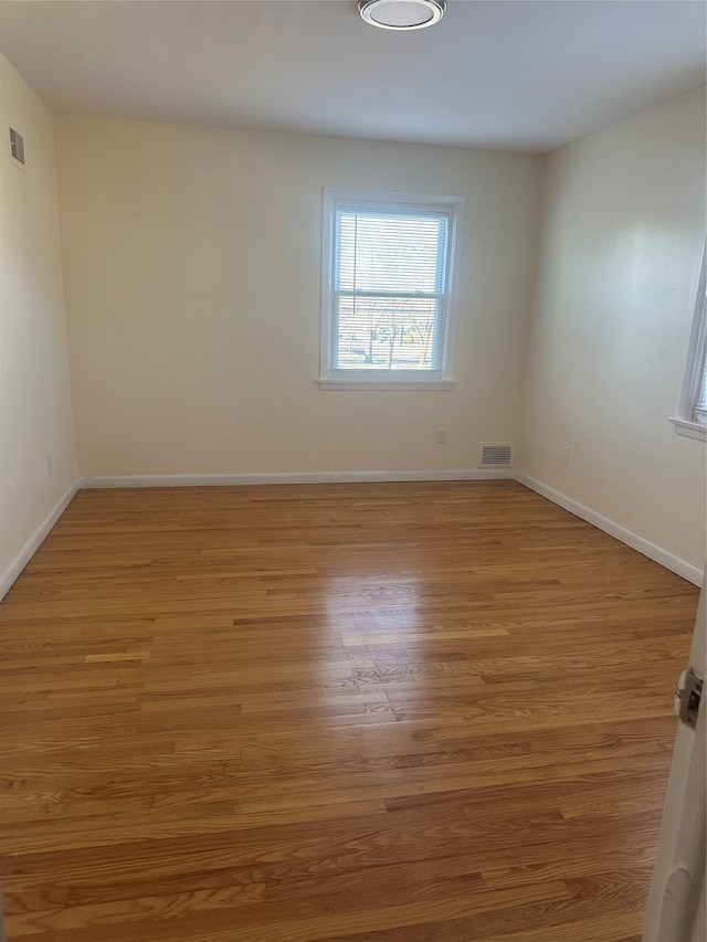 empty room featuring light hardwood / wood-style flooring