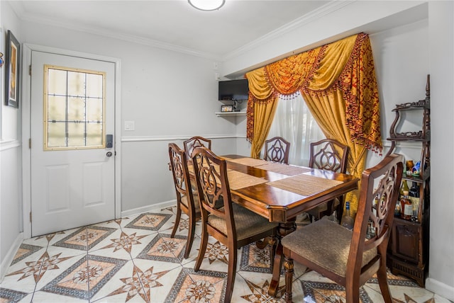 dining area with crown molding