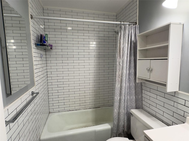 bathroom with shower / bath combo with shower curtain and toilet