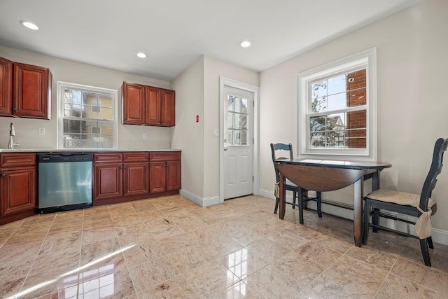 kitchen featuring stainless steel dishwasher and sink