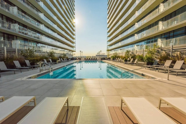 view of pool featuring a patio