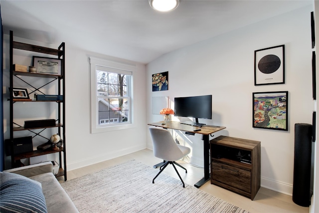 office area with light hardwood / wood-style flooring