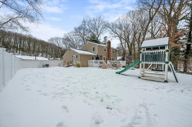 view of snow covered playground