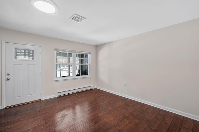 entrance foyer with baseboard heating and dark hardwood / wood-style flooring