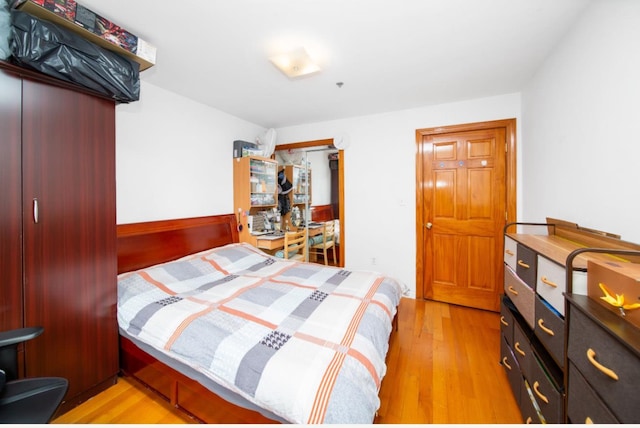 bedroom featuring light hardwood / wood-style floors