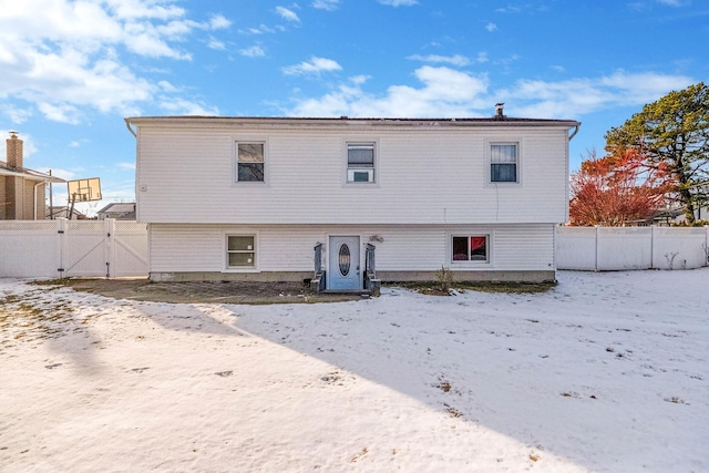 view of snow covered house