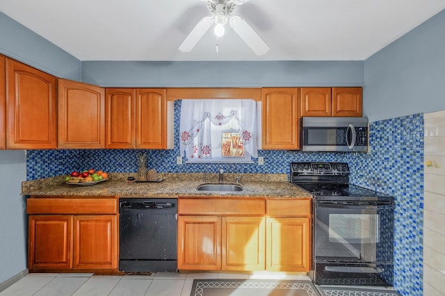 kitchen featuring sink, backsplash, black appliances, and ceiling fan