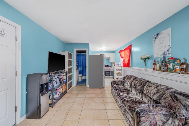 living room featuring light tile patterned floors