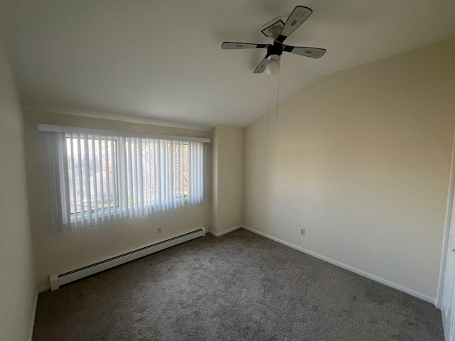 carpeted empty room featuring ceiling fan, lofted ceiling, and a baseboard heating unit