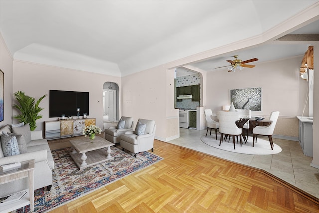 living room featuring parquet flooring and ceiling fan