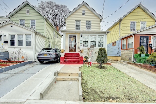 front of property with a front lawn