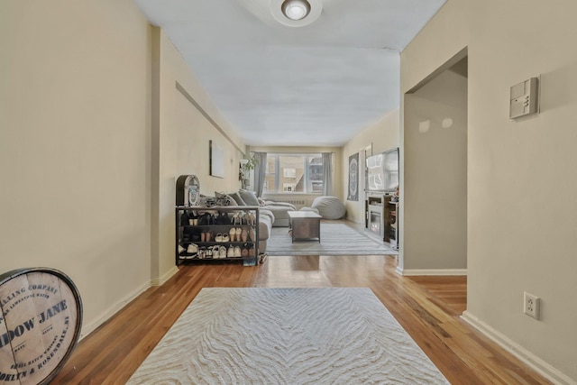 interior space with hardwood / wood-style flooring