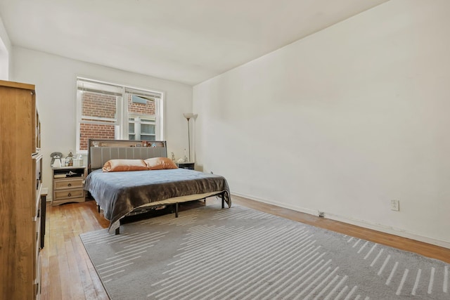 bedroom featuring light wood-type flooring