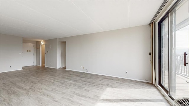 empty room featuring light hardwood / wood-style floors