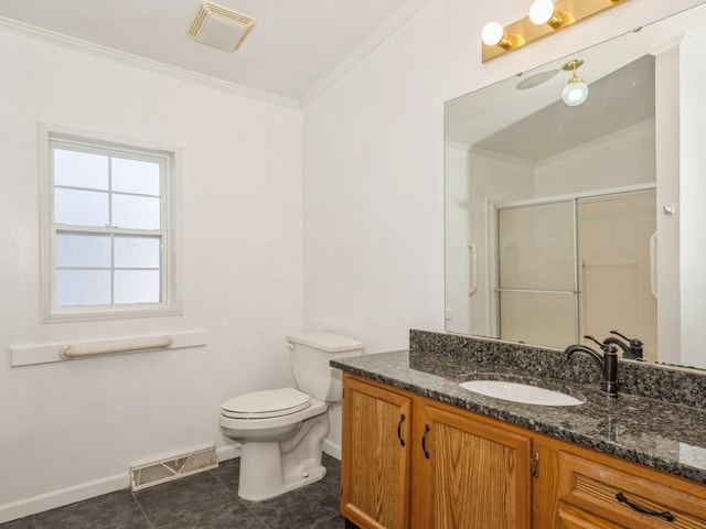 bathroom featuring vanity, ornamental molding, an enclosed shower, toilet, and tile patterned floors