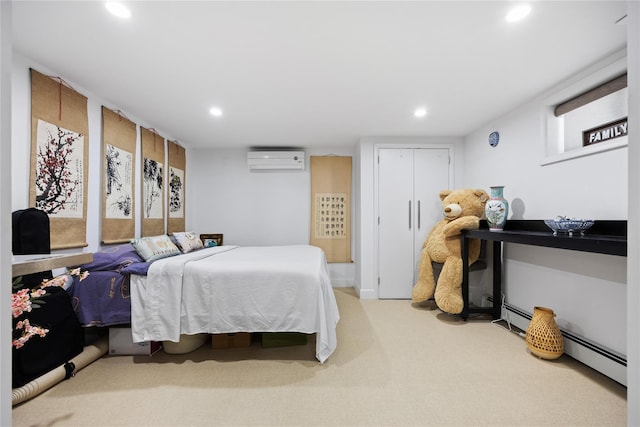 carpeted bedroom featuring a wall mounted air conditioner