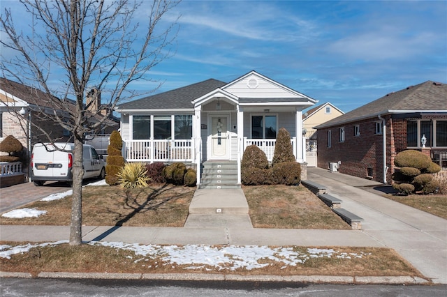 bungalow-style home with a porch