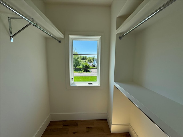 2045 Willow Dr, East Marion, NY 11939 - walk in closet featuring wood finished floors