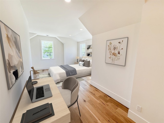 2045 Willow Dr, East Marion, NY 11939 - bedroom with lofted ceiling, baseboards, light wood-type flooring, recessed lighting, and a desk