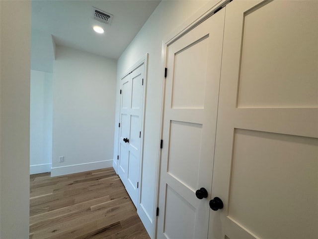 2045 Willow Dr, East Marion, NY 11939 - hall with wood finished floors, baseboards, and recessed lighting