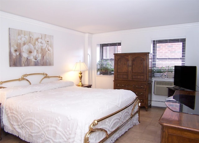 bedroom with crown molding and parquet floors