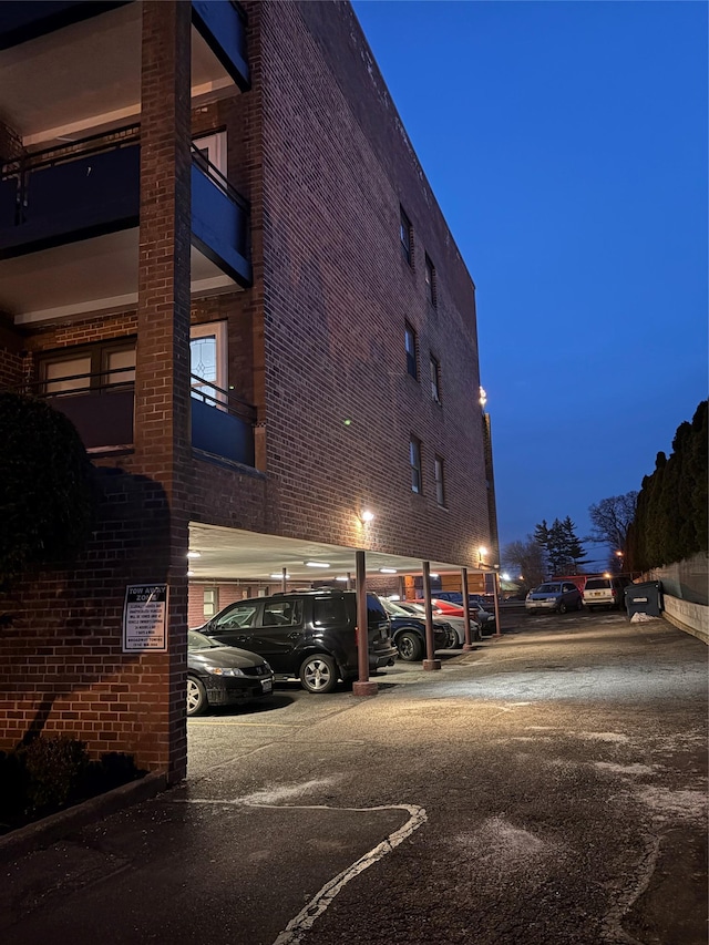 view of outdoor building at dusk