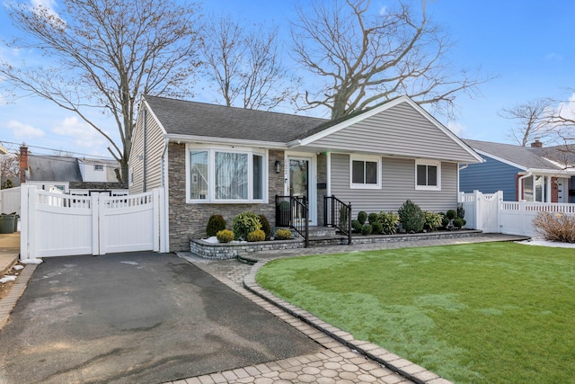 view of front of home with a front lawn