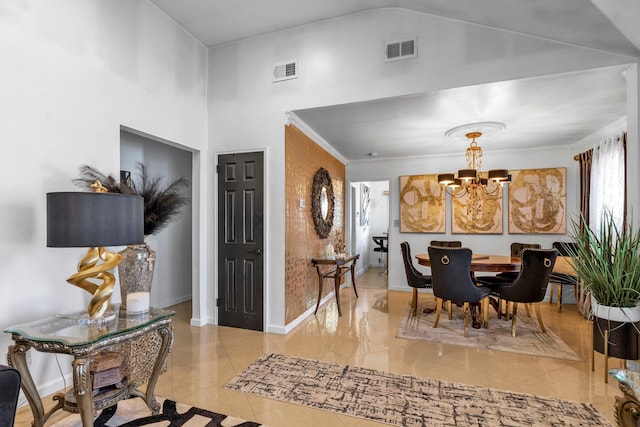 dining room featuring crown molding, high vaulted ceiling, light tile patterned floors, and a chandelier