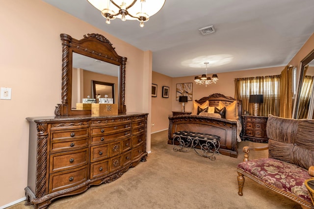 carpeted bedroom with an inviting chandelier