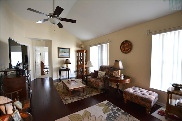 living room with hardwood / wood-style flooring, high vaulted ceiling, and ceiling fan