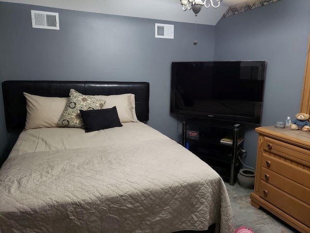 bedroom featuring lofted ceiling