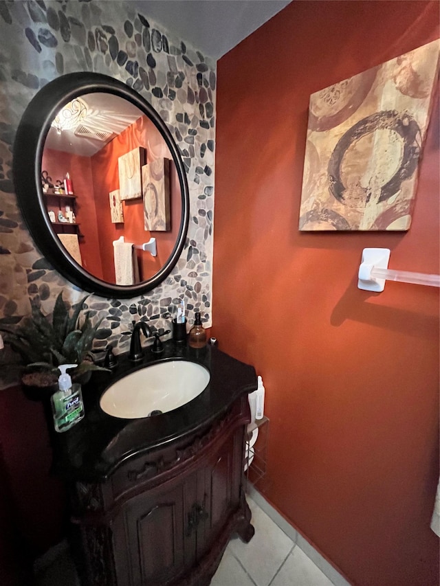 bathroom with tile patterned flooring and vanity