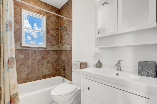 full bathroom featuring shower / tub combo with curtain, vanity, and toilet