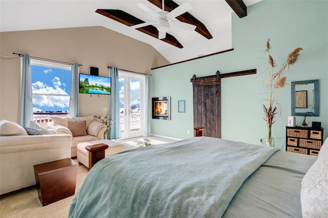 carpeted bedroom with ceiling fan, lofted ceiling with beams, french doors, access to outside, and a barn door