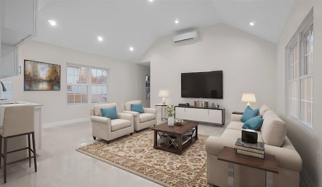 living room with light tile patterned floors, vaulted ceiling, and an AC wall unit