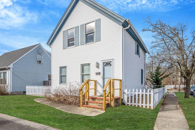 view of front of home featuring a front lawn