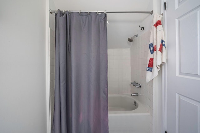 bathroom featuring shower / bath combination with curtain