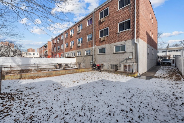 view of snow covered property