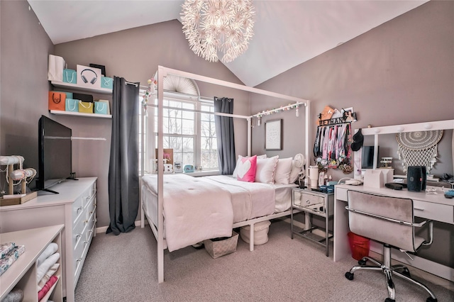 carpeted bedroom with vaulted ceiling and a chandelier