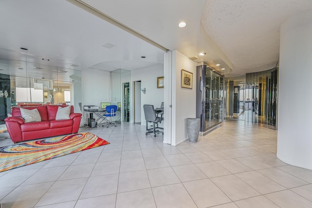 living room featuring light tile patterned floors