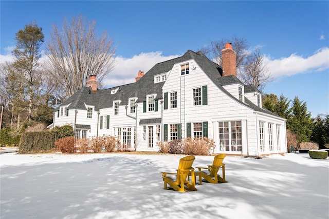 view of snow covered house