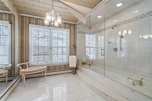 bathroom featuring tiled shower / bath combo, crown molding, and an inviting chandelier