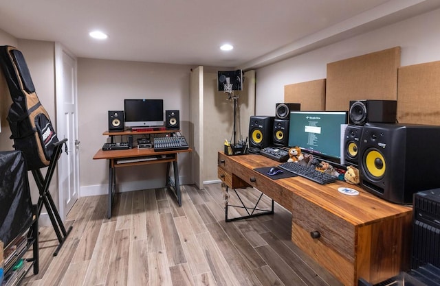 office space with light hardwood / wood-style floors