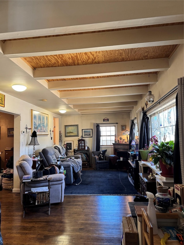 living room with wooden ceiling, beamed ceiling, and wood finished floors