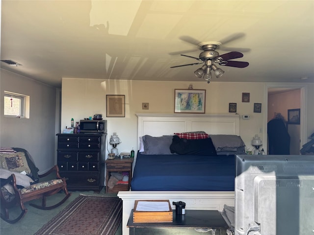 bedroom featuring visible vents