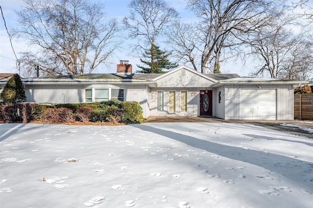 single story home with a garage