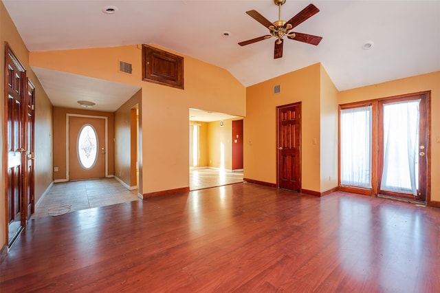 foyer entrance featuring hardwood / wood-style flooring, ceiling fan, and lofted ceiling