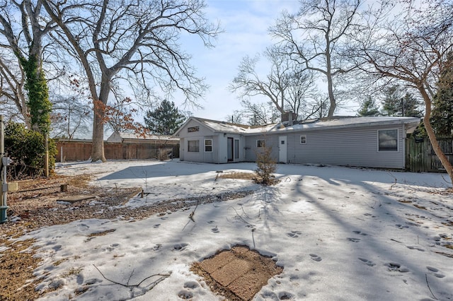 view of snow covered house