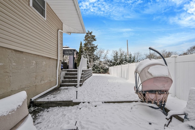 view of yard covered in snow